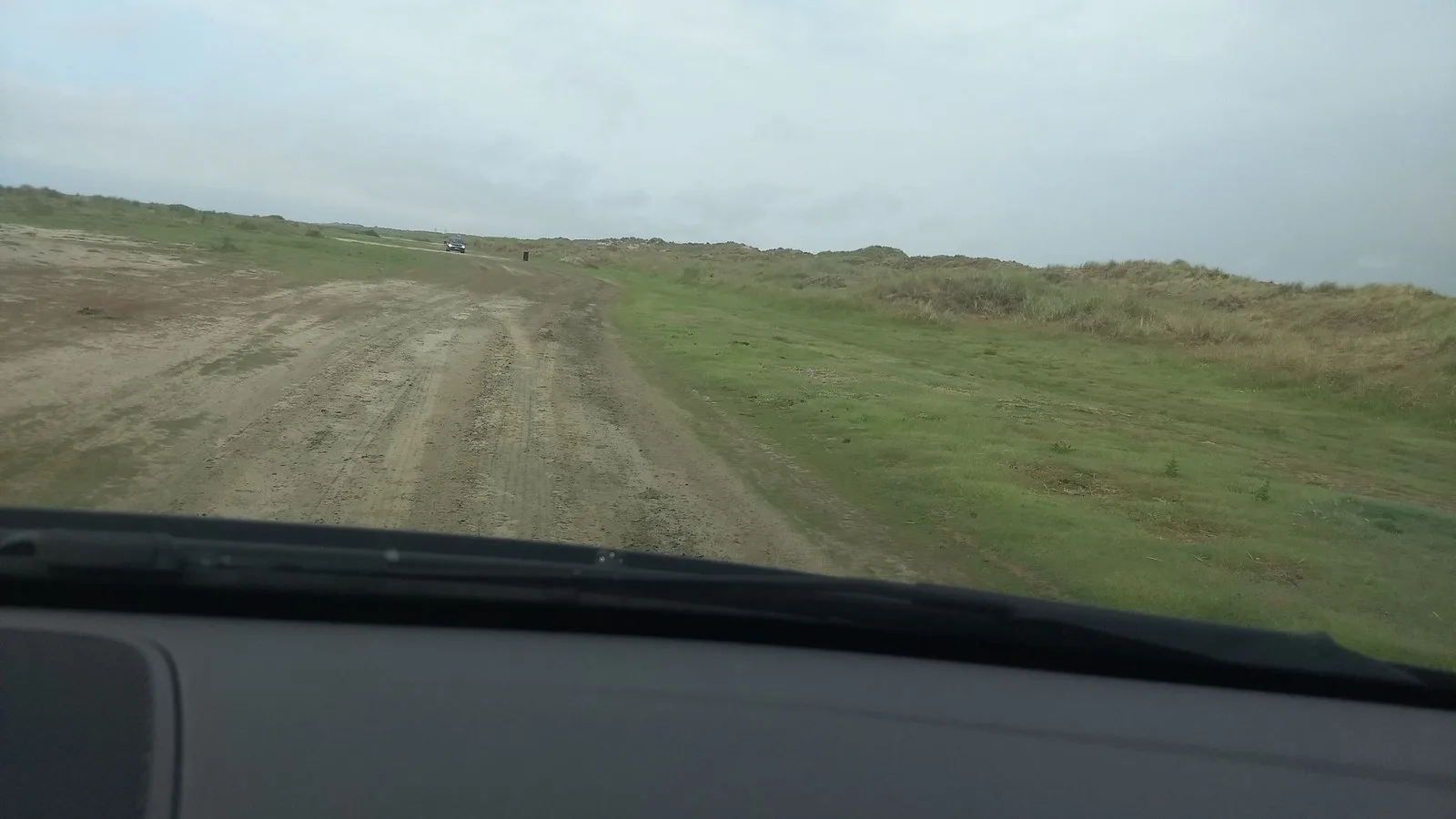 Mapillary-foto ved Badegewässer: BUGGYOMRÅDET ML. BADESTI 22 OG 23